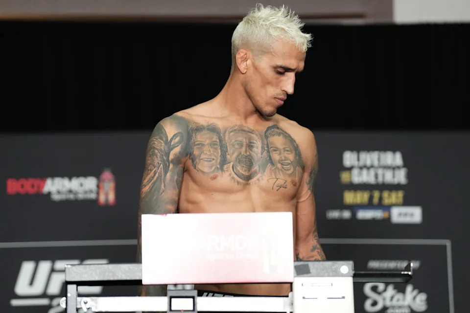 PHOENIX, ARIZONA - MAY 06: Charles Oliveira of Brazil reacts after failing to make weight, vacating the UFC lightweight championship, during the UFC 274 official weigh-in at the Hyatt Regency hotel on
